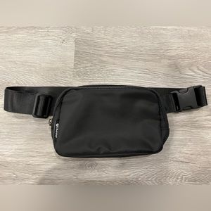 Black hip pack / sling bag